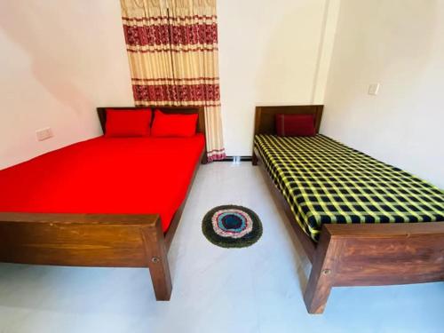 Voodi või voodid majutusasutuse Coco Resort & Villa toas