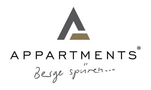 a handwritten serif font in black and white at Bergwelten in Bludenz