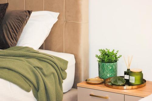 Ένα ή περισσότερα κρεβάτια σε δωμάτιο στο Villa Aurelia Wellness