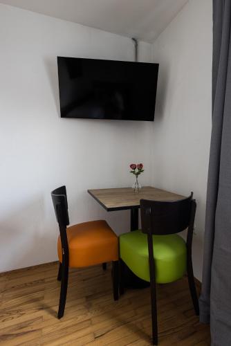 TV a/nebo společenská místnost v ubytování WORK N LIVE Fühl Dich zu Hause