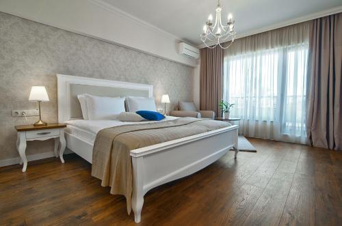 Ένα ή περισσότερα κρεβάτια σε δωμάτιο στο Sunny Castle Hotel - All Inclusive, Beach and Free parking