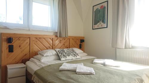 Posteľ alebo postele v izbe v ubytovaní Apartamenty Milka