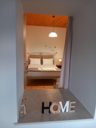 Ένα ή περισσότερα κρεβάτια σε δωμάτιο στο Sweet Red Home