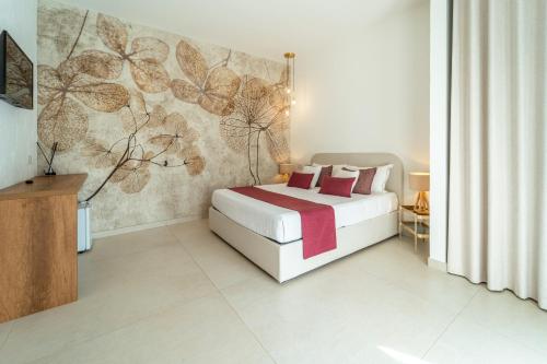 Ένα ή περισσότερα κρεβάτια σε δωμάτιο στο Agriturismo Ciriè - 6 Camere, Piscina & Colazione