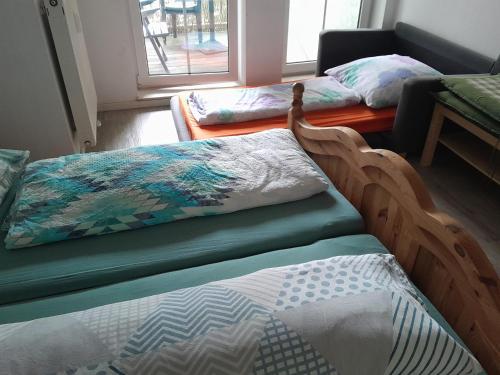 Katil atau katil-katil dalam bilik di Appartement Denis