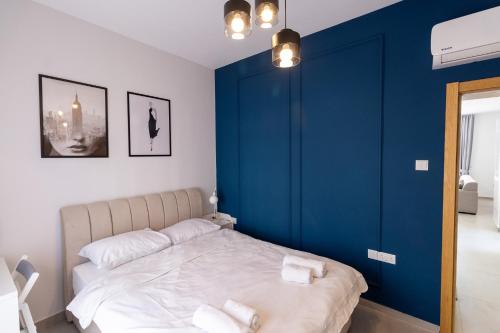 Voodi või voodid majutusasutuse Caesar Cliff Holiday Apartments toas