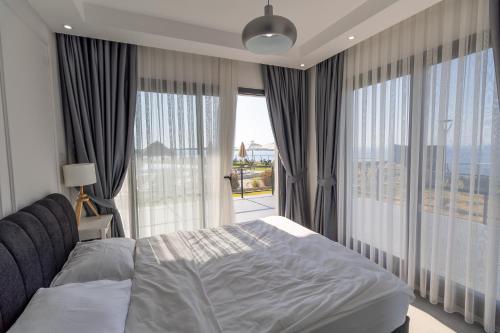 Voodi või voodid majutusasutuse Caesar Cliff Holiday Apartments toas