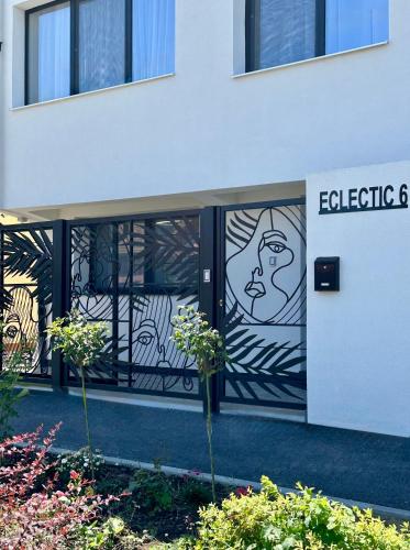 a glass door with a picture of a man on it at Eclectic 6 in Satu Mare