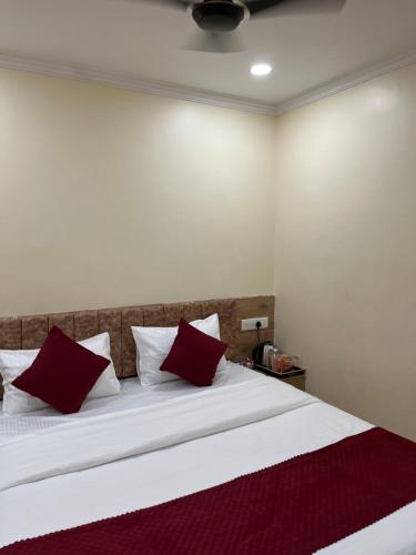 Ένα ή περισσότερα κρεβάτια σε δωμάτιο στο Coco Inn Homestay