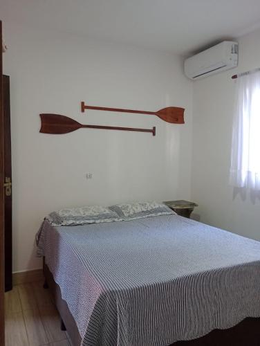 Postel nebo postele na pokoji v ubytování Pousada Parapuã