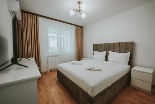 Katil atau katil-katil dalam bilik di Luxury Apartment of Suceava