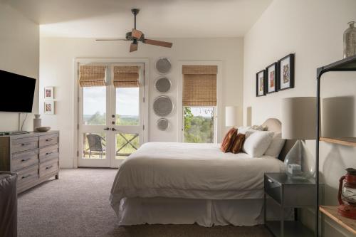 Ένα ή περισσότερα κρεβάτια σε δωμάτιο στο Sage Hill Inn & Spa