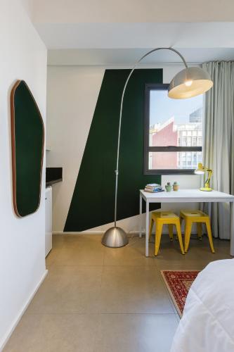 Postel nebo postele na pokoji v ubytování Hotel Centro433
