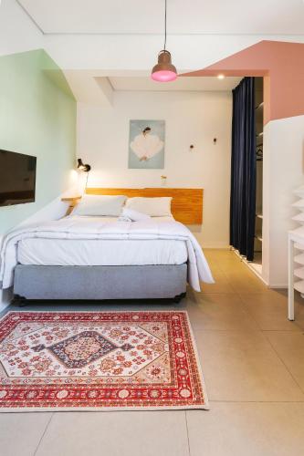 Postel nebo postele na pokoji v ubytování Hotel Centro433