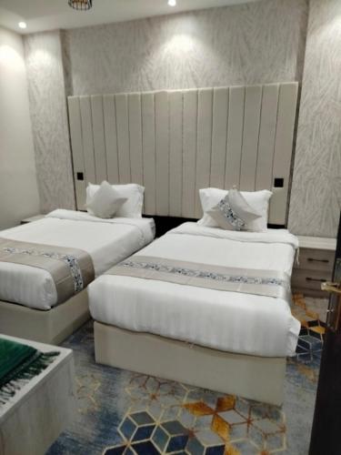 Letto o letti in una camera di روز سيتي للشقق المخدومة