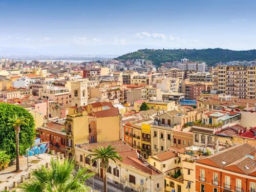 an aerial view of a city with buildings at Hotel Villa Fanny in Cagliari
