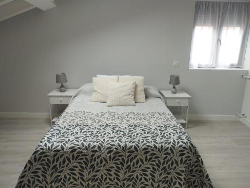 Ένα ή περισσότερα κρεβάτια σε δωμάτιο στο Casa María