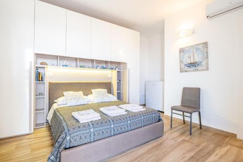 Postel nebo postele na pokoji v ubytování B&B Punta Stilo