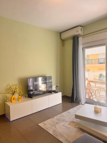 TV a/nebo společenská místnost v ubytování Greywood Nest