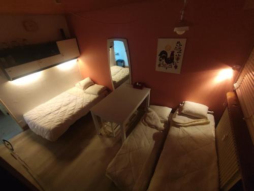 Postel nebo postele na pokoji v ubytování Studio avec vue montagne au pied des pistes