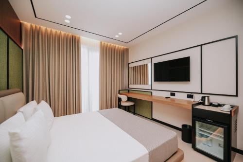 TV a/nebo společenská místnost v ubytování Hotel Jaroal