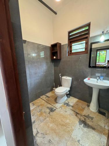 Ένα μπάνιο στο Villa Thasha