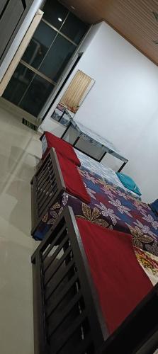 a bedroom with a bed and a window at Love shore holidays vagamon 455 chottupara in Vagamon
