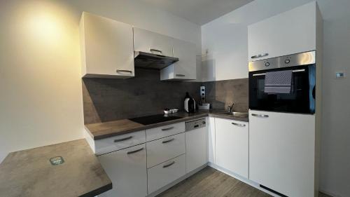 Dapur atau dapur kecil di Blue Riverside Apartments