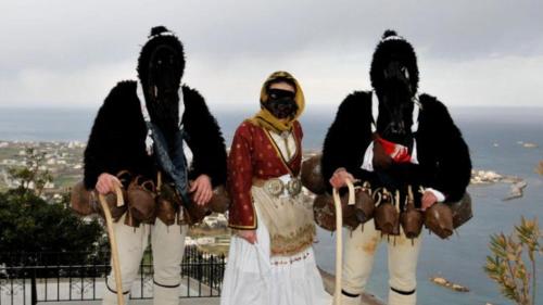 three people in costumes standing on top of a hill at Mary's House 2 in Skiros