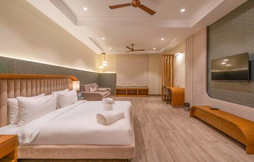 Un ou plusieurs lits dans un hébergement de l'établissement Excel Hotels & Resorts, Corbett
