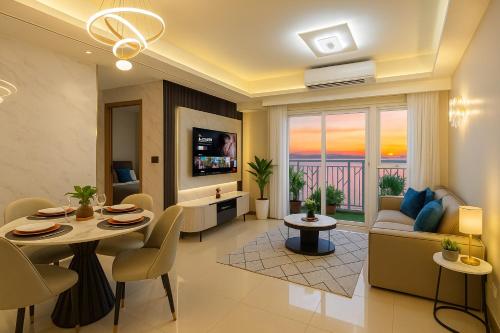 a living room with a couch and a table at Luxury Suites near Okada, Solaire, City of Dreams in Manila
