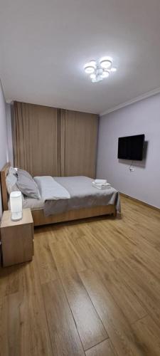 Ένα ή περισσότερα κρεβάτια σε δωμάτιο στο hostel
