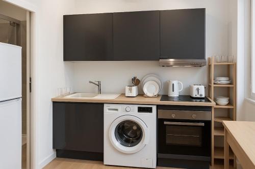 Kuchyň nebo kuchyňský kout v ubytování Appartement cosy coeur Montpellier