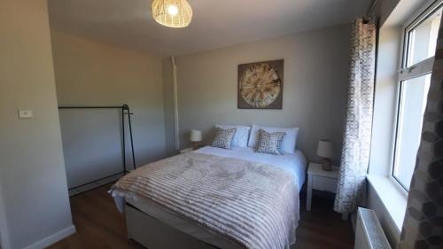 Ein Bett oder Betten in einem Zimmer der Unterkunft Kilbrien Mountain view