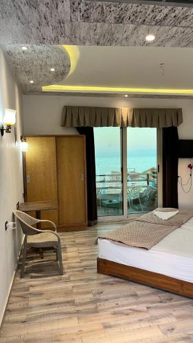 Katil atau katil-katil dalam bilik di Eel garden paradise dahab