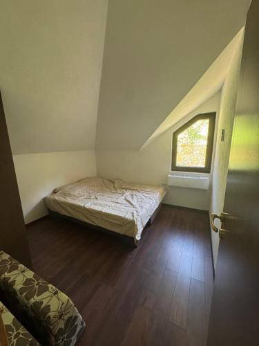 Ένα ή περισσότερα κρεβάτια σε δωμάτιο στο Casa Del Lago