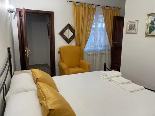Postel nebo postele na pokoji v ubytování Casa vacanze Castellara