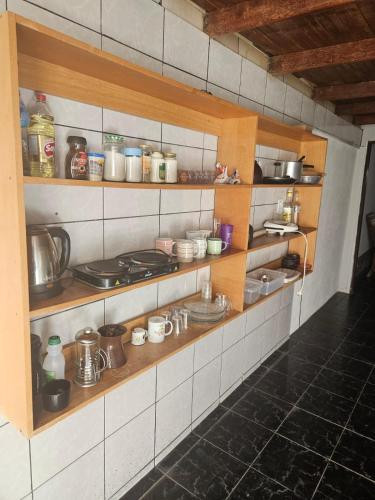 Η κουζίνα ή μικρή κουζίνα στο Quarto - suíte baru - Centro Histórico da Cidade de Goiás