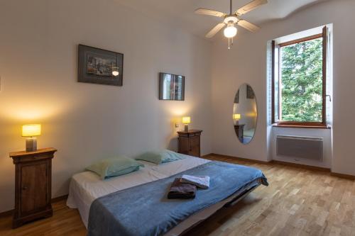 Postel nebo postele na pokoji v ubytování Maison De Vacances Sud Ardèche