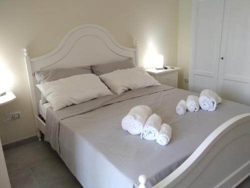 Katil atau katil-katil dalam bilik di Palazzo dei Sogni Rooms Suite