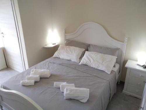 Katil atau katil-katil dalam bilik di Palazzo dei Sogni Rooms Suite