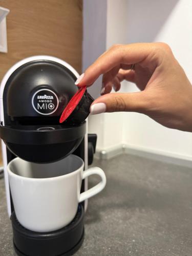 Coffee and tea making facilities at Lamda Deluxe Apartments