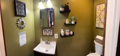 a bathroom with a sink and a toilet at S and S Homestead in Rochester