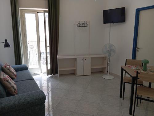 TV a/nebo společenská místnost v ubytování Guest House Casa Minardi