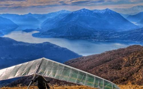 a glider on top of a mountain with a view at Orèn b&b in Casargo