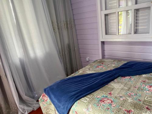 Un ou plusieurs lits dans un hébergement de l'établissement Monte Hermon hospedagem