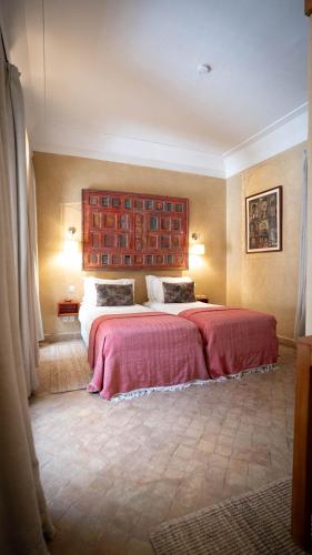 Cama o camas de una habitación en Riad Anata