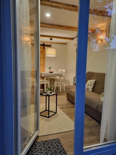 a living room with a couch and a table at House Notturno in Otočac