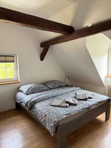 Postel nebo postele na pokoji v ubytování Apartmány Růžová