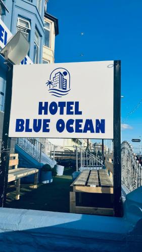 a sign for a hotel blue ocean in front of a building at HOTEL BLUE OCEAN - Call For Cheap Prices - Check In Until 3AM in Blackpool